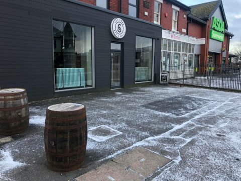 in front of business before