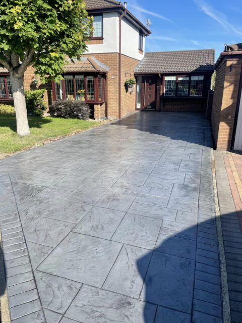 imprinted concrete driveway and patio front